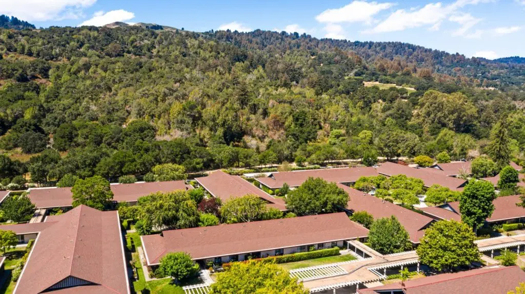 Exterior drone shot of the Apartments at Portola Valley
