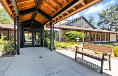 Portola Valley covered walkway, with bench.