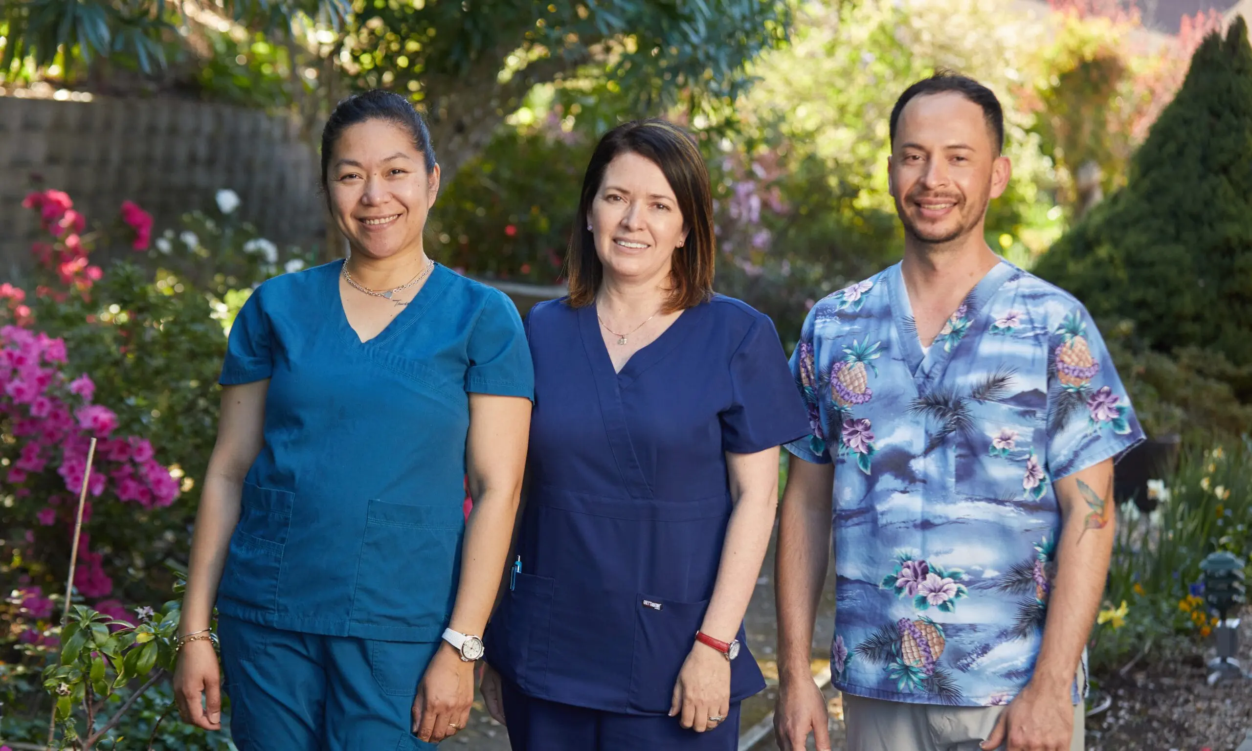 Three nurses, two females one male, Skilled Nursing at Sequoia Living
