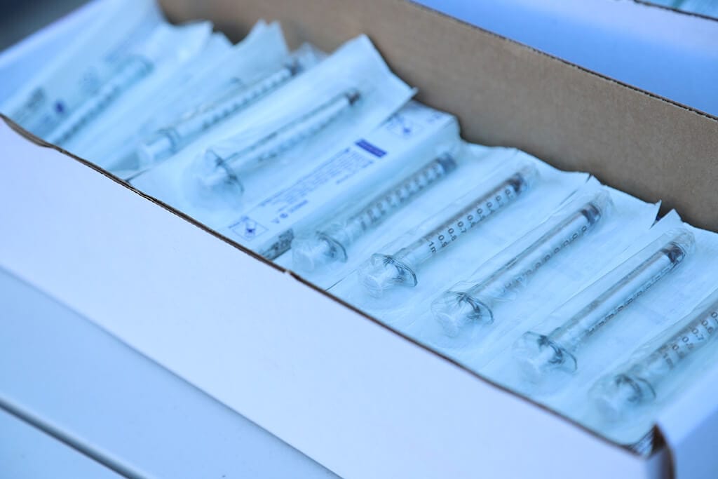 photo of a box of syringes