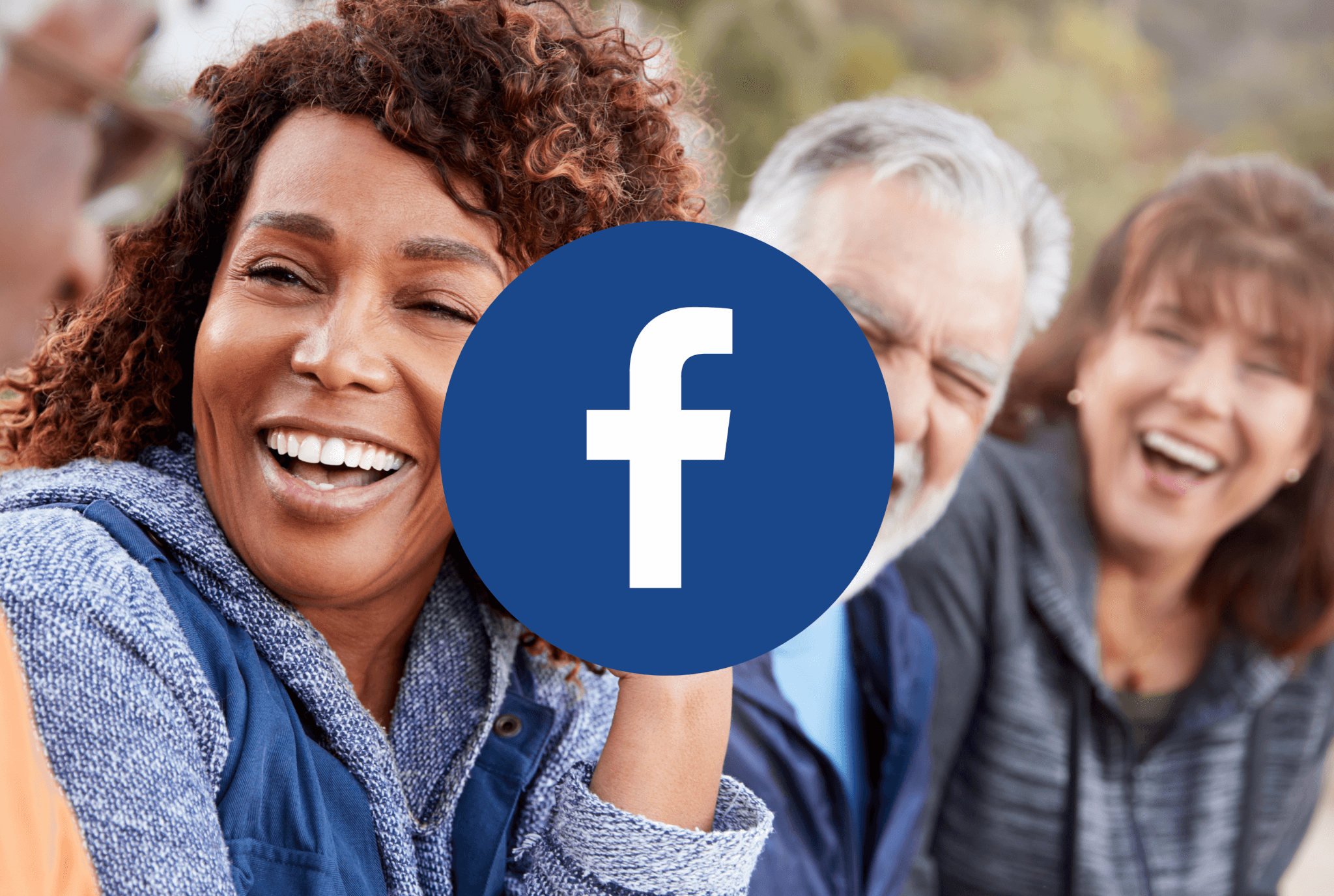 Group of older people sitting and laughing. Blue Facebook logo in front.