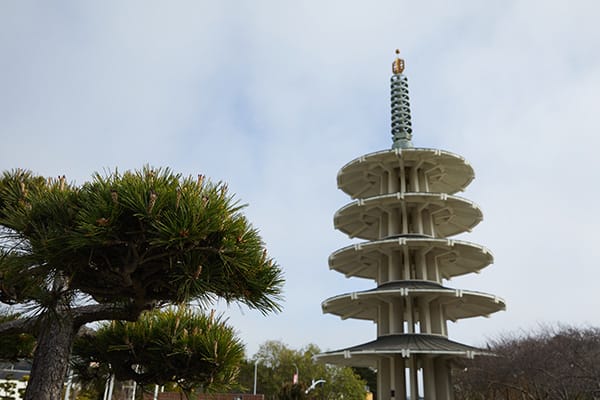 Japantown in San Francisco shows an image of the Peace Pagoda surrounded by trees.