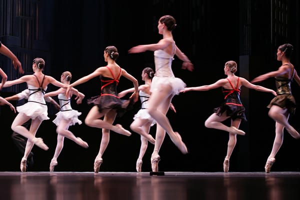 San Francisco Ballet. Group of ballet dancers dance onstage.