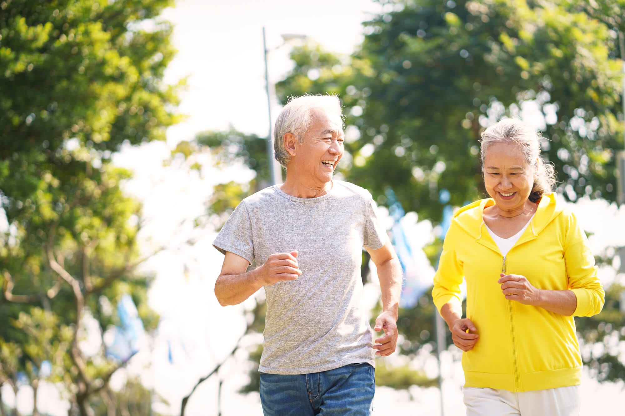 Sequoia Living | stroke prevention webinar. Elderly couple on a run.