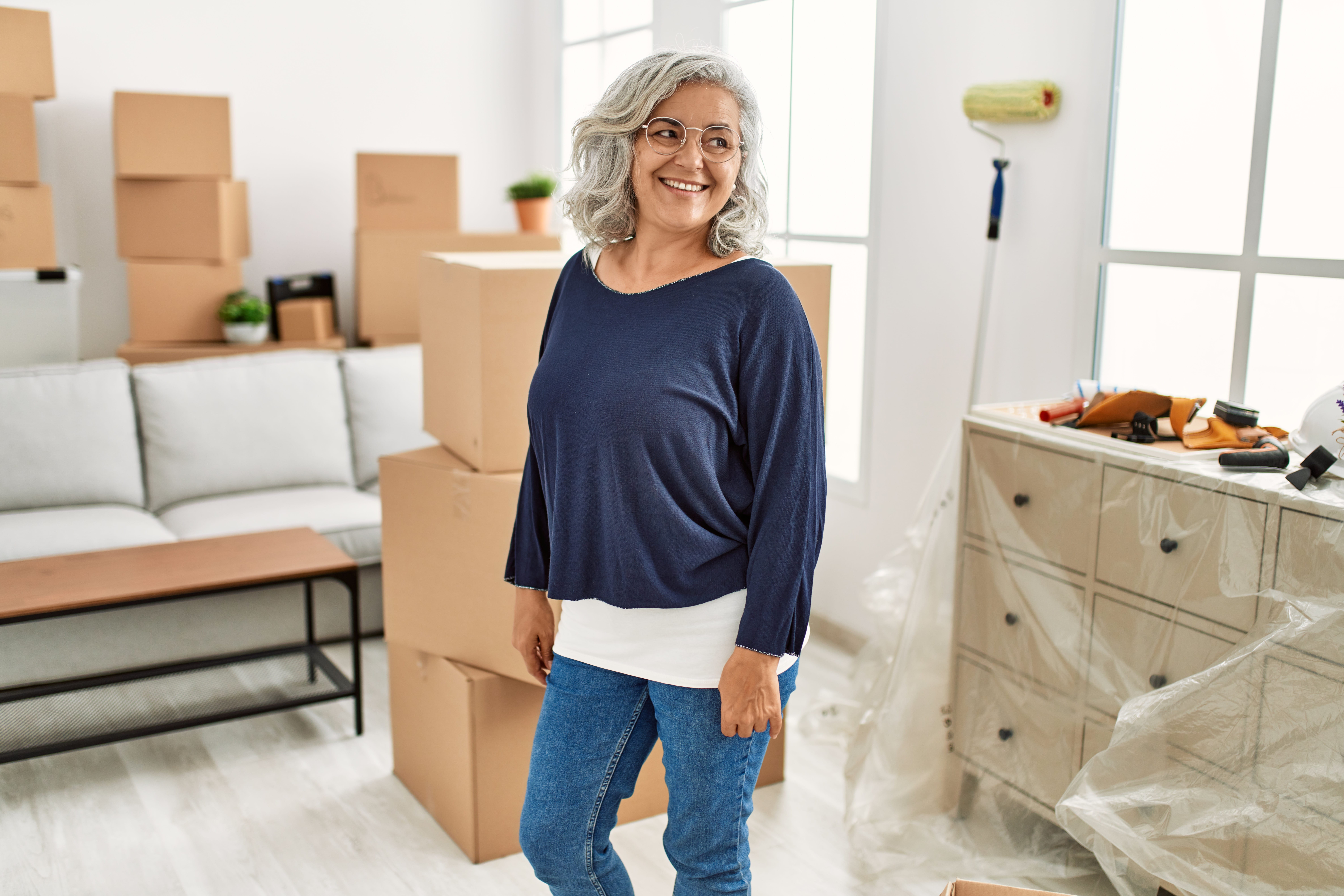 downsizing, older adult female, boxes, moving day
