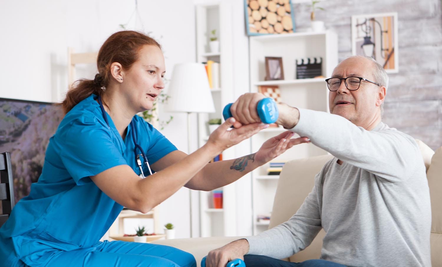 Older adult man in skilled nursing doing physical therapy with weights, , nursing home , caregiver