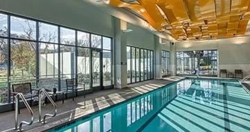 indoor pool with gold ceiling.
