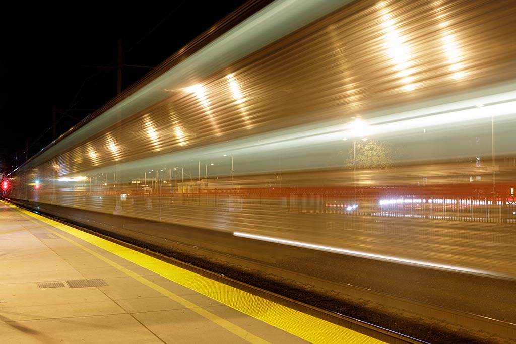 Train, blurred to show fast movement