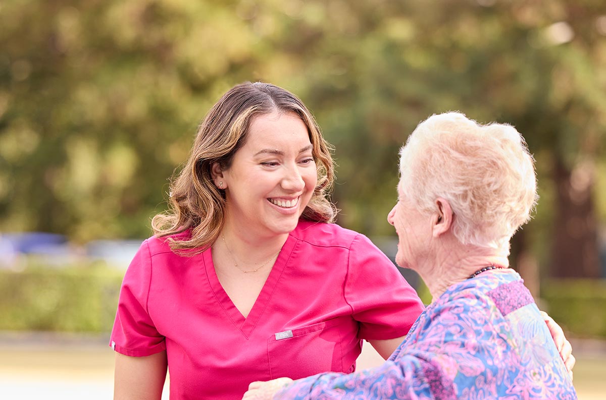Skilled Nursing | The Sequoias Portola Valley, caregiver staff with resident
