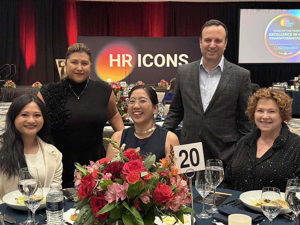 Sequoia Living’s Chief People Officer and HR managers smiling at a banquet table during the 2025 HR Icons Awards, where the organization received the Best Workplace Culture Award.