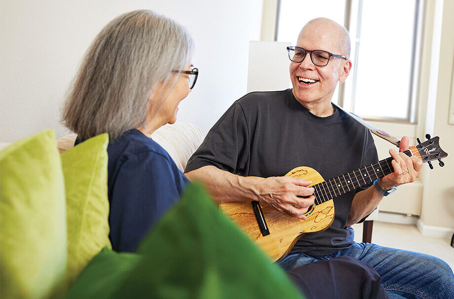 The Sequoias San Francisco, Don and wife, in apartment with ukulele