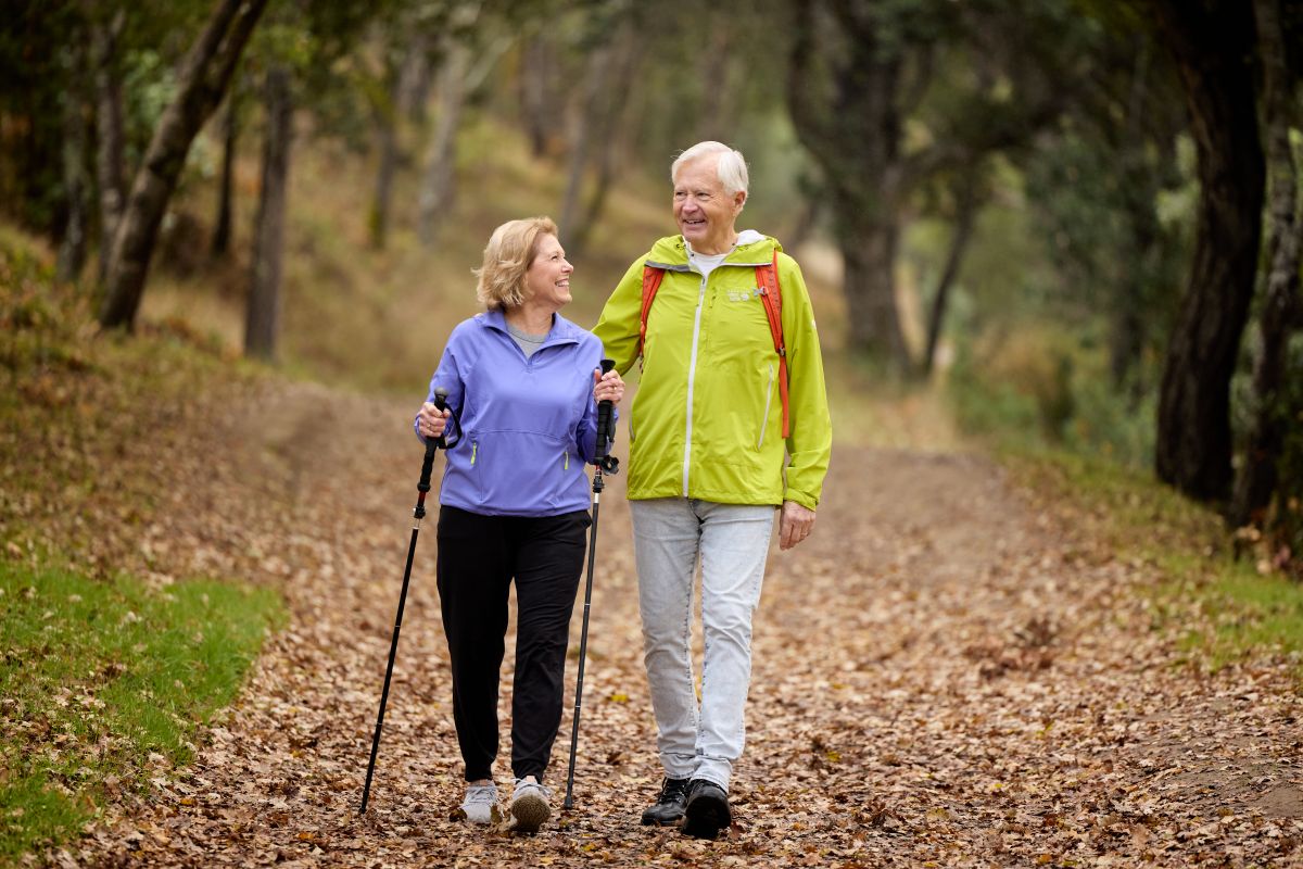 Tell Me More | Mike and Suzanne hiking Windy Hill Preserve in Portola Valley, outdoor, on trail, happy joyful couple