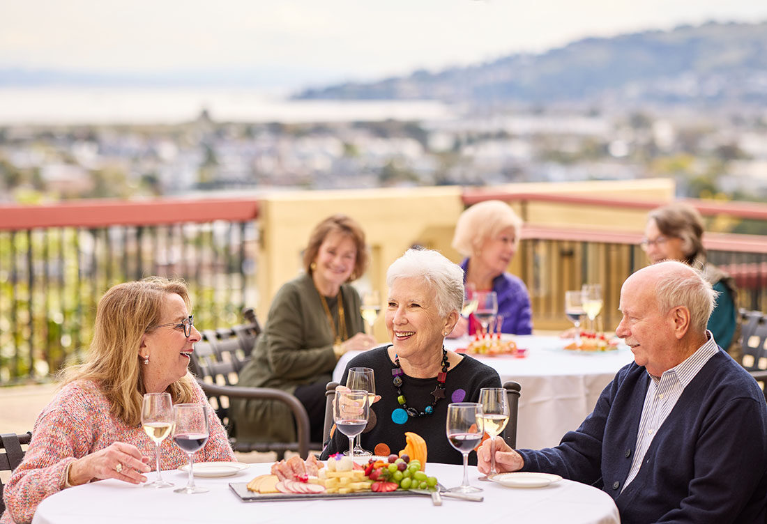 HappyHour, a group of residents dining outdoors, with a view, The Tamalpais Marin