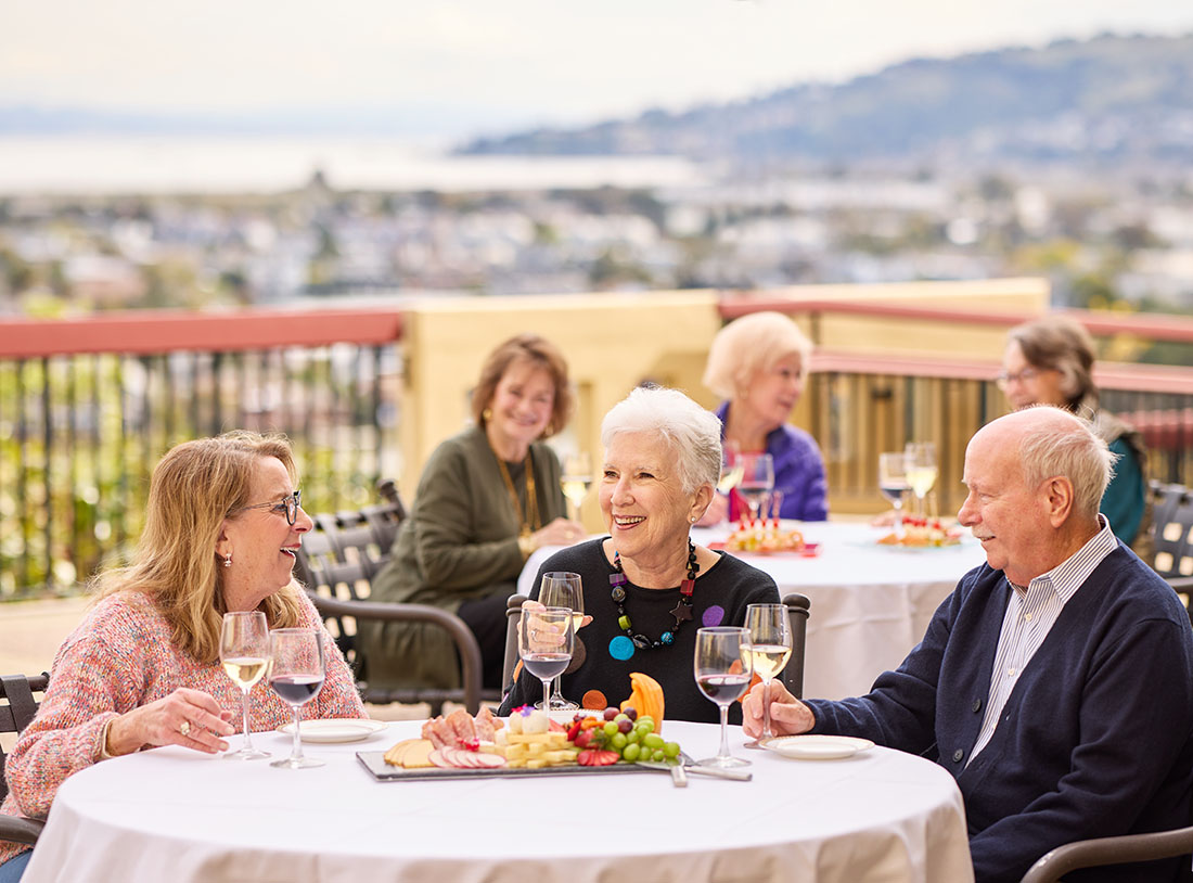 HappyHour, a group of residents dining outdoors, with a view, The Tamalpais Marin